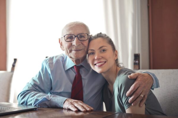 Carer supporting a client at home