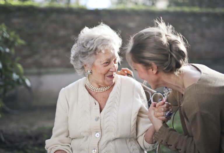 Charisma Services carer supporting a client at home